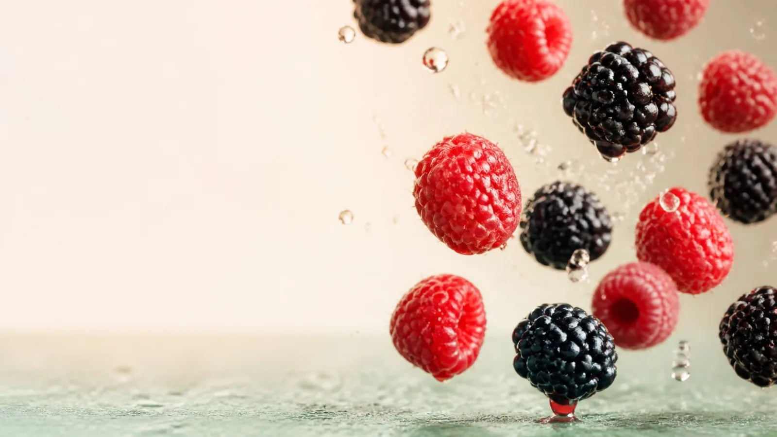 Fresh raspberries splashing