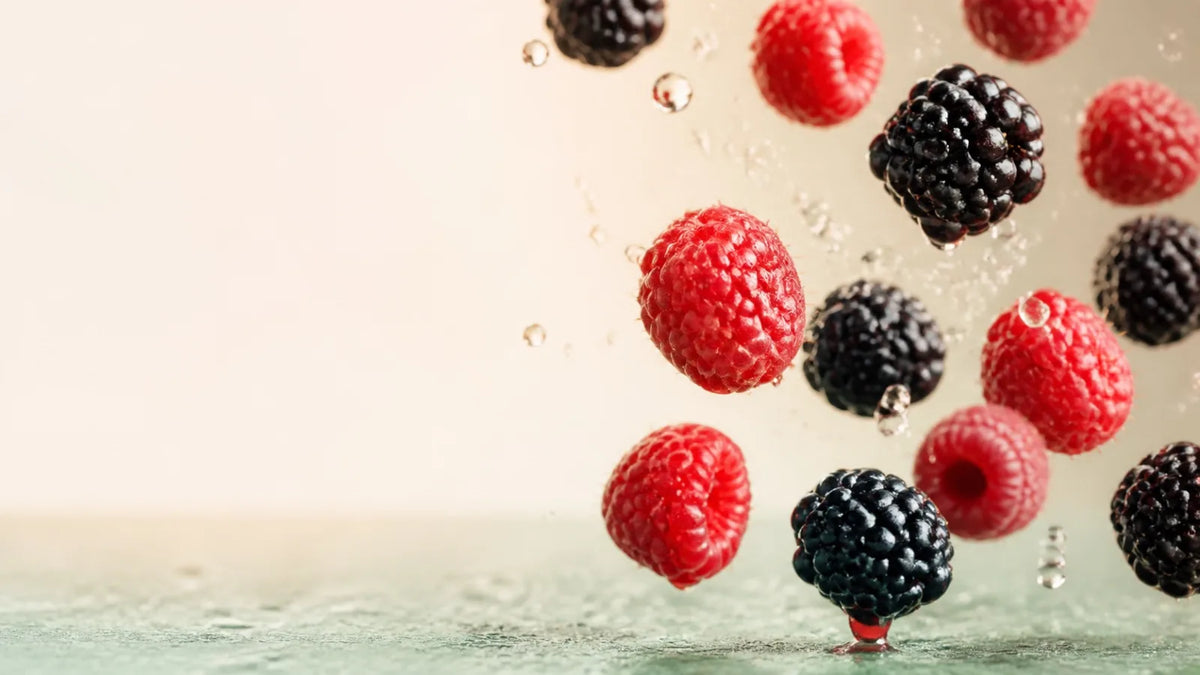 Fresh raspberries splashing